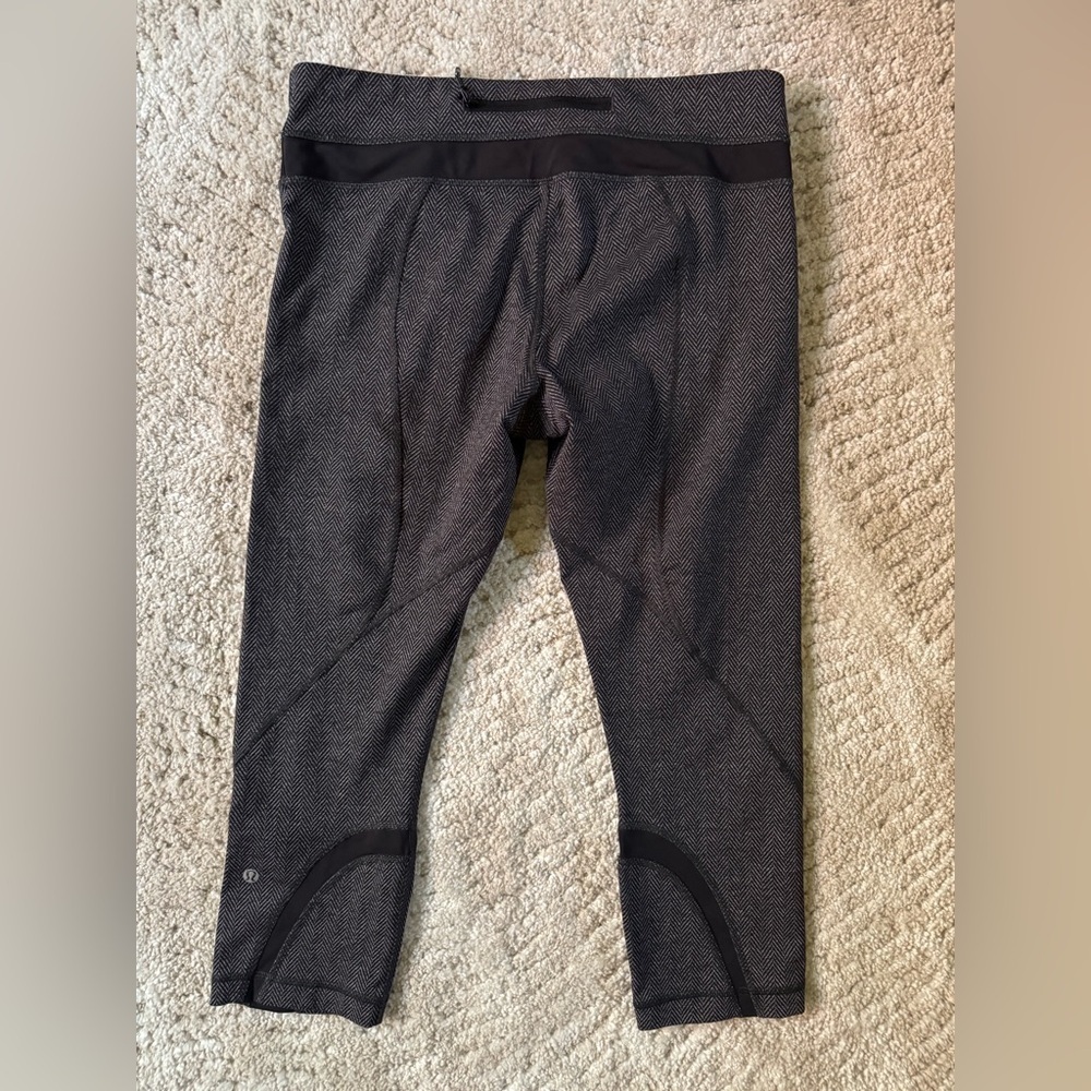 Lululemon Run: Inspire Crop II in the giant herringbone black heathered pattern